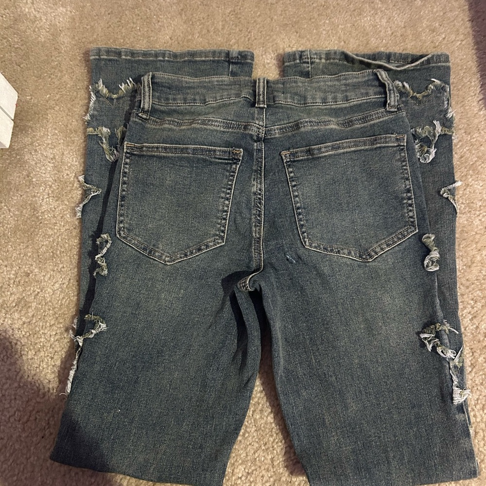 Distressed Star-Patterned Jeans - image 3